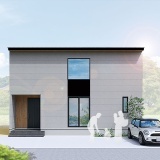 グレーを基調とした外壁に木目調のアクセントが映える重厚感のある外観デザインです。