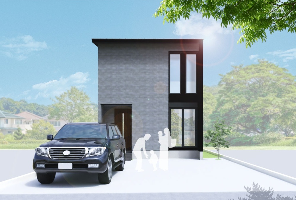 柔らかな質感の大判タイルが、落ち着きのあるモダンな存在感を与える外観デザインです。