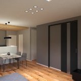 キッチンの木目調の下がり天井が温もりを感じさせ、グレー調の壁紙が高級感と落ち着いた雰囲気を演出するモダンデザインです。