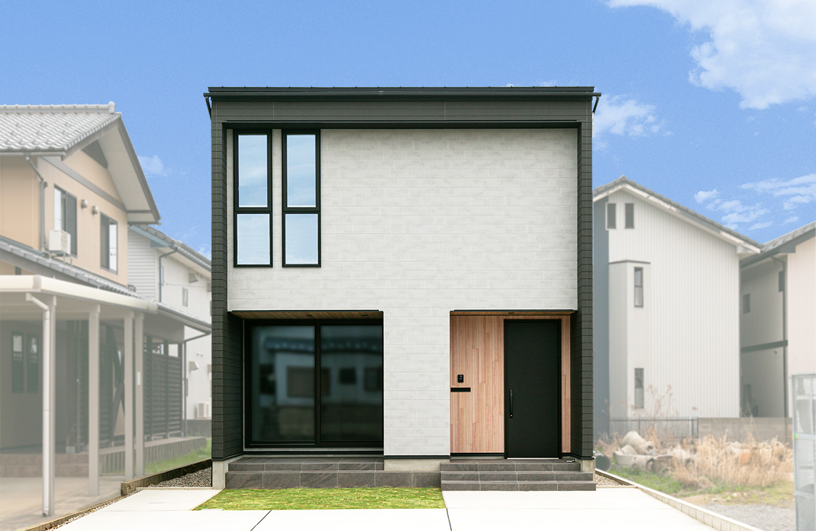 柔らかな質感の大判タイルに木目調のアクセントが上質なデザイン